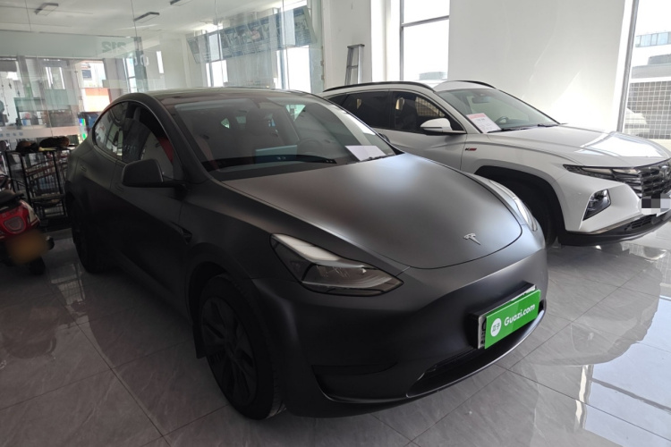 Tesla Model Y 2024 #4 Tesla Model Y 2024 car image #4