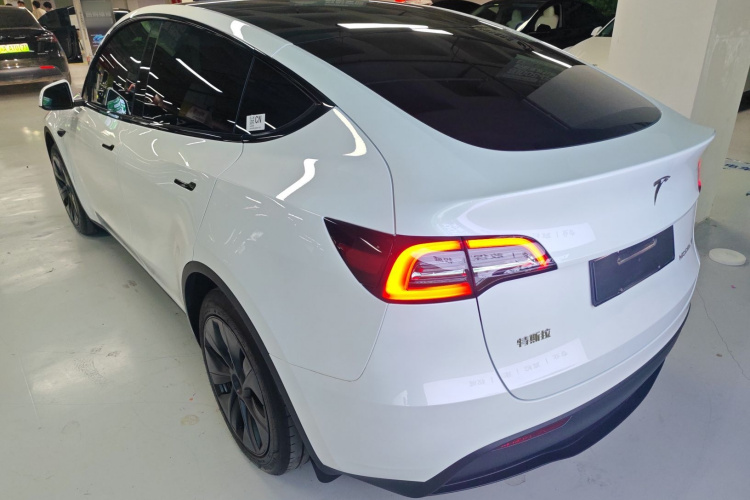 Tesla Model Y 2024 #7 Tesla Model Y 2024 car image #7