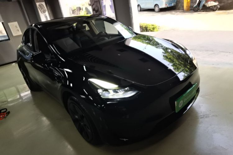 Tesla Model Y 2024 #4 Tesla Model Y 2024 car image #4