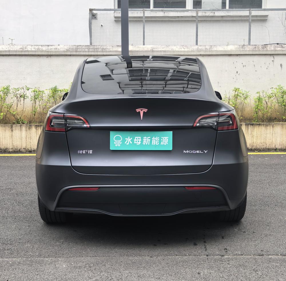 Tesla Model Y 2024 #5 Tesla Model Y 2024 car image #5