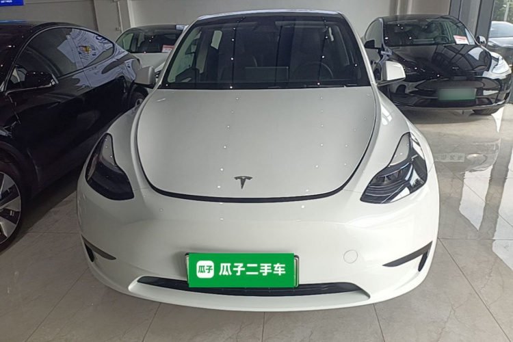 Tesla Model Y 2024 #3 Tesla Model Y 2024 car image #3