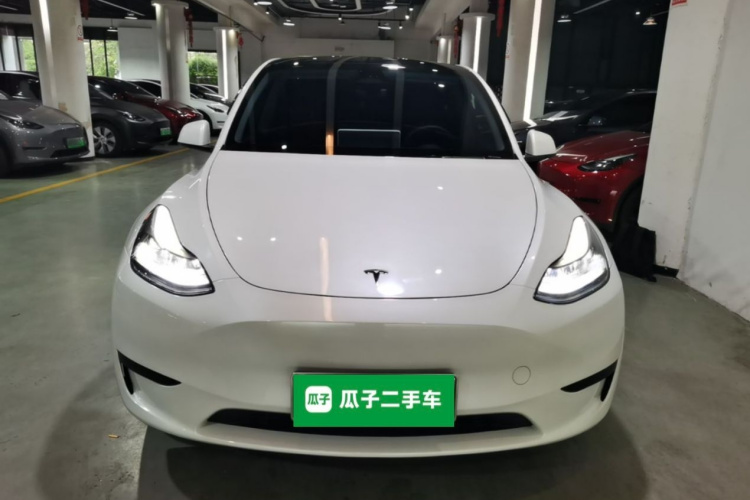 Tesla Model Y 2024 #3 Tesla Model Y 2024 car image #3