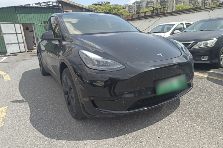 Tesla Model Y 2024 #4 Tesla Model Y 2024 car image #4