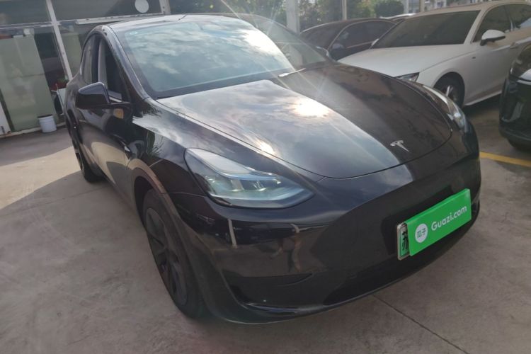 Tesla Model Y 2024 #4 Tesla Model Y 2024 car image #4
