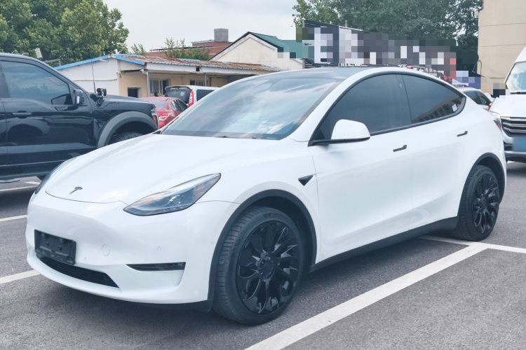 Tesla Model Y 2024 #2 Tesla Model Y 2024 car image #2
