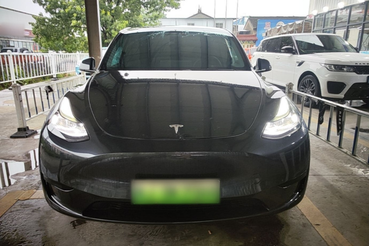 Tesla Model Y 2024 #3 Tesla Model Y 2024 car image #3