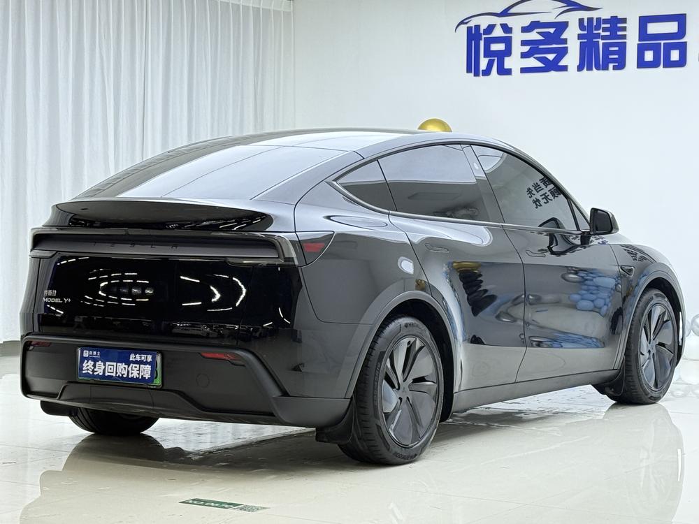 Tesla Model Y 2025 #6 Tesla Model Y 2025 car image #6
