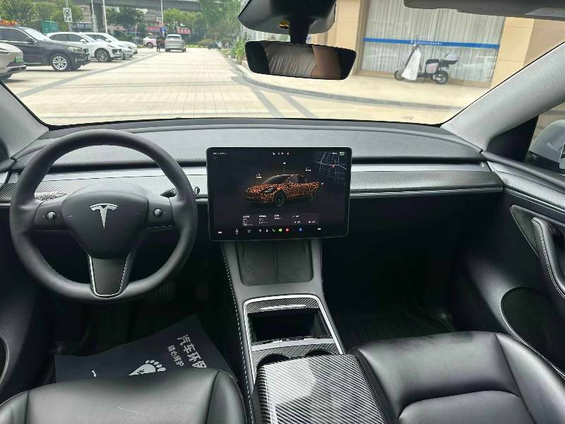Tesla Model Y 2024 #6 Tesla Model Y 2024 car image #6
