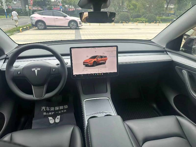 Tesla Model Y 2024 #6 Tesla Model Y 2024 car image #6