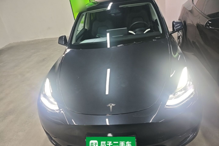 Tesla Model Y 2024 #3 Tesla Model Y 2024 car image #3