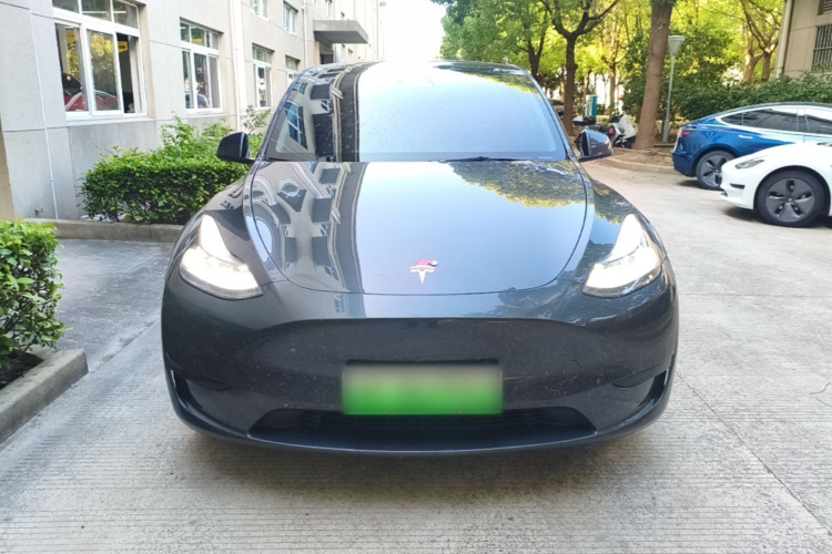 Tesla Model Y 2024 #3 Tesla Model Y 2024 car image #3