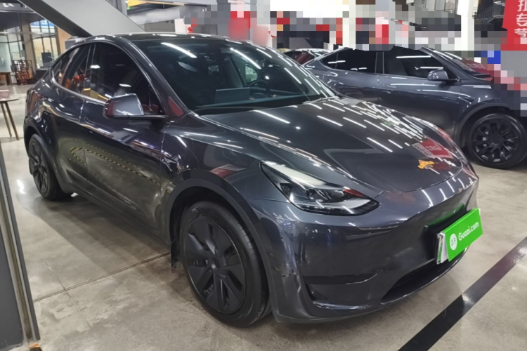 Tesla Model Y 2025 #6 Tesla Model Y 2025 car image #6