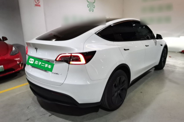Tesla Model Y 2024 #7 Tesla Model Y 2024 car image #7