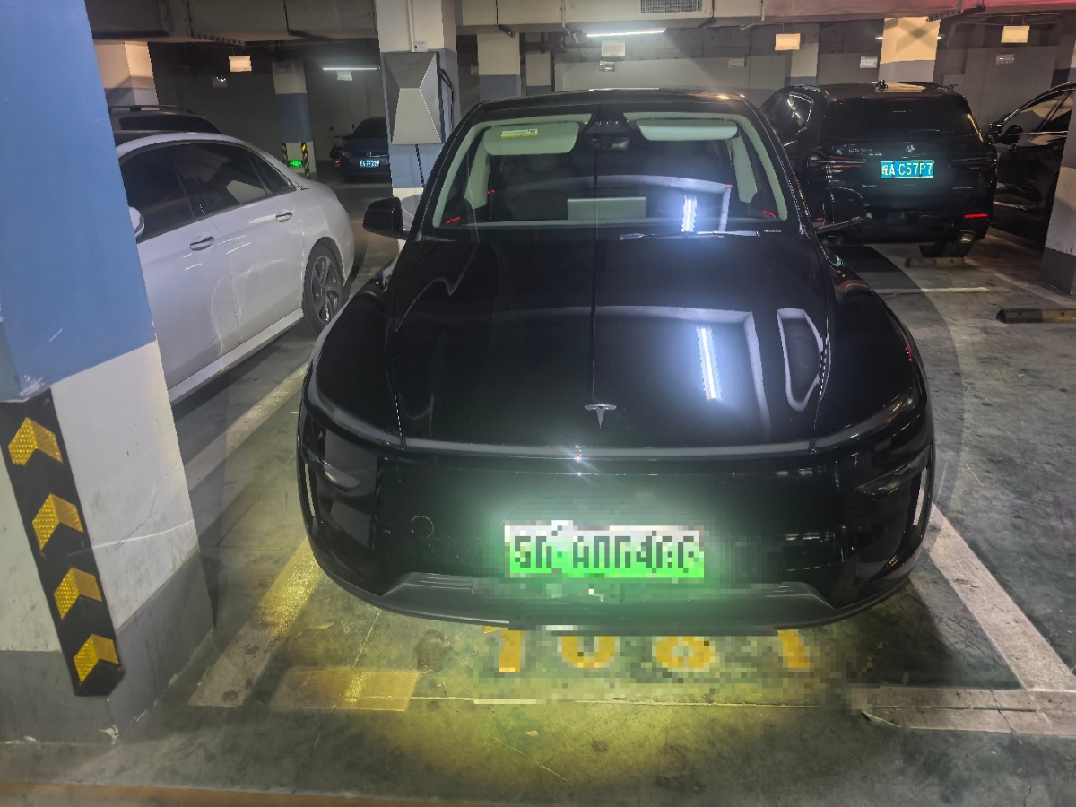 Tesla Model Y 2025 #2 Tesla Model Y 2025 car image #2