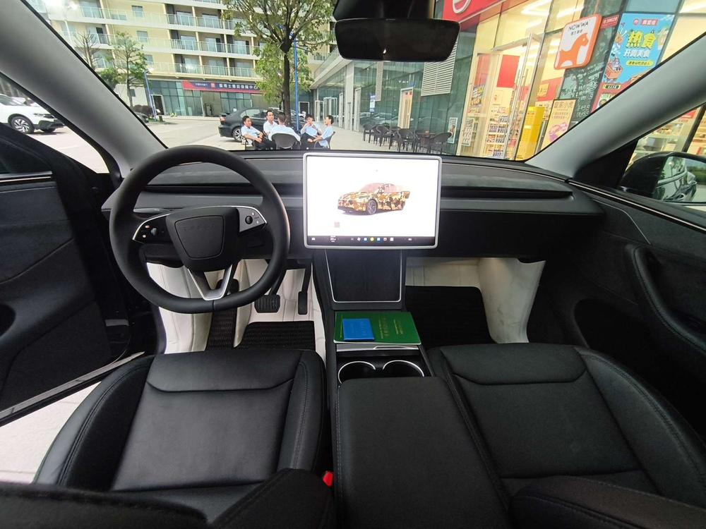 Tesla Model Y 2025 #7 Tesla Model Y 2025 car image #7