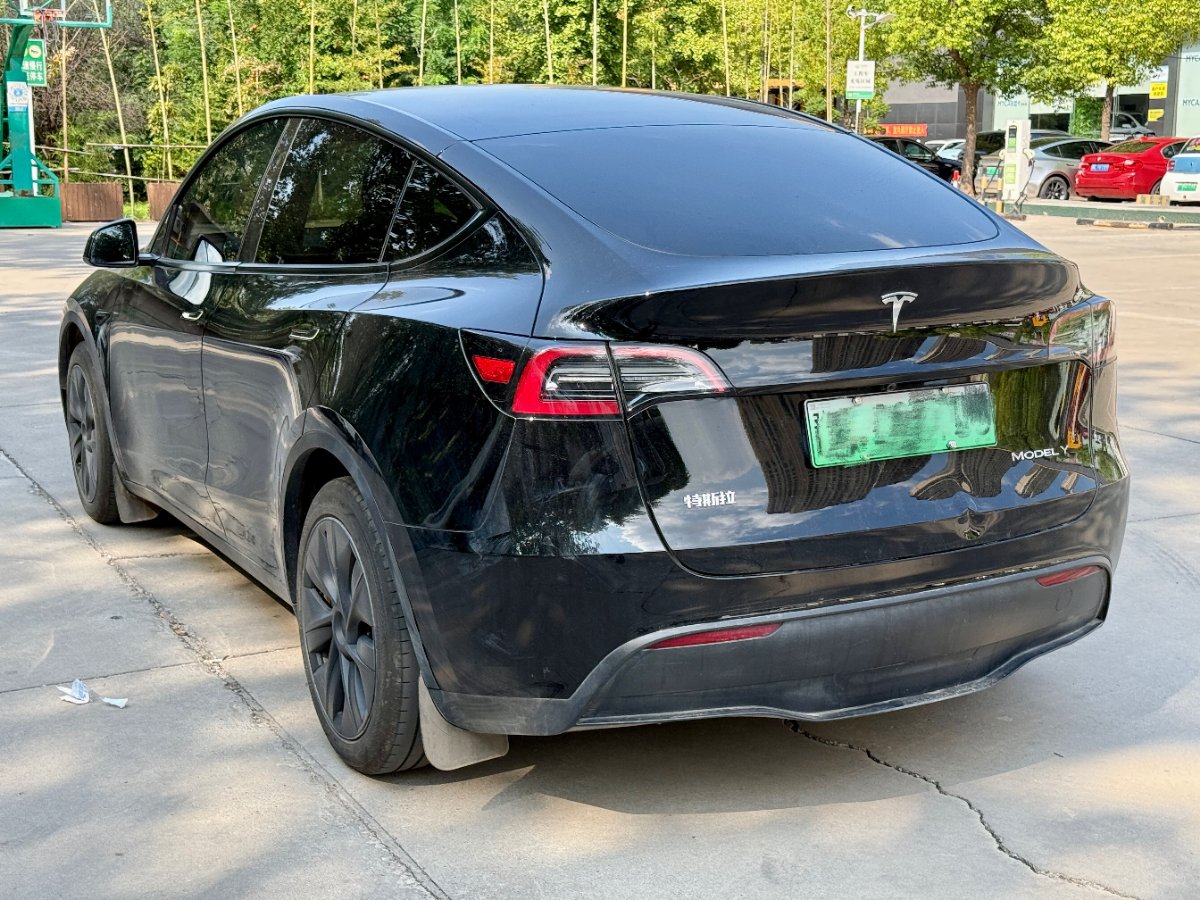 Tesla Model Y 2024 #5 Tesla Model Y 2024 صورة سيارة #5