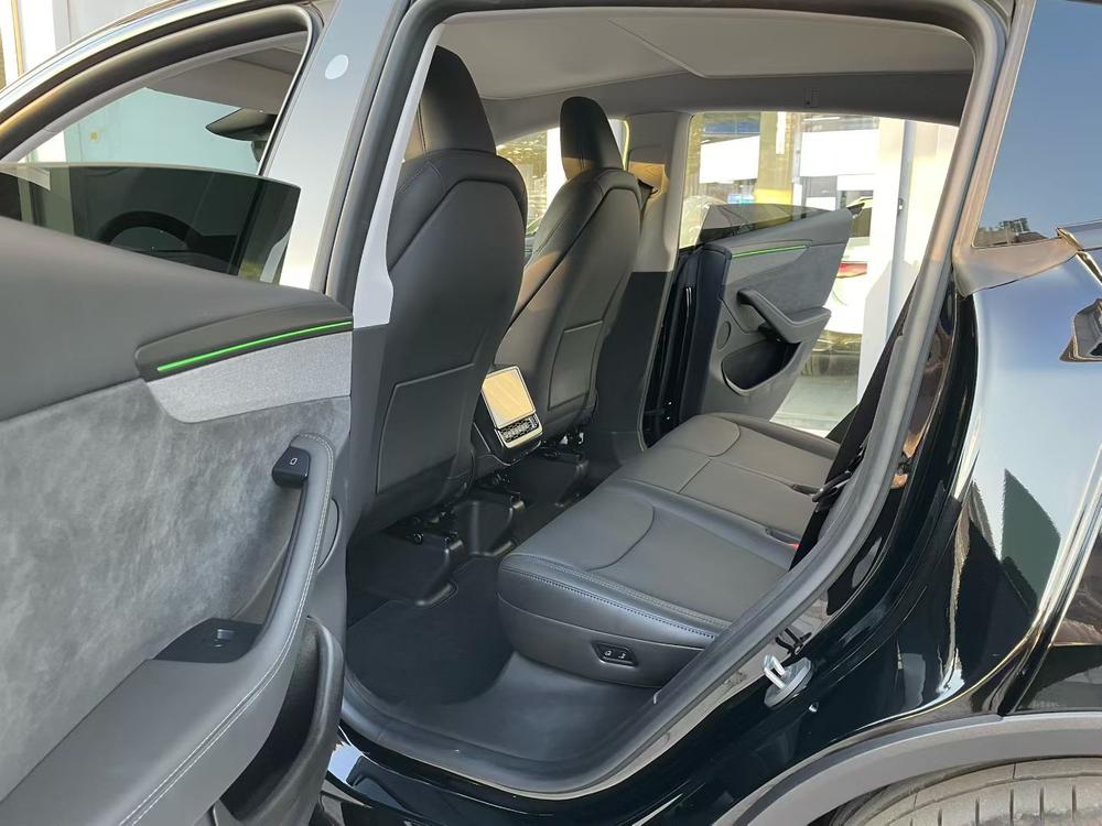 Tesla Model Y 2025 #14 Tesla Model Y 2025 car image #14