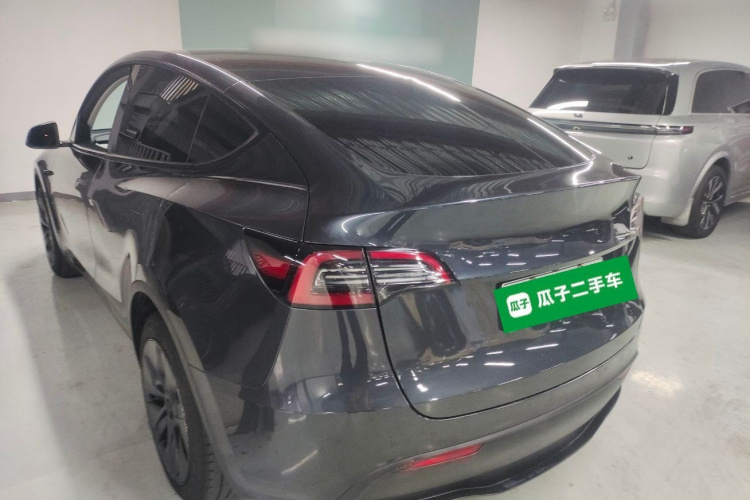 Tesla Model Y 2024 #7 Tesla Model Y 2024 car image #7