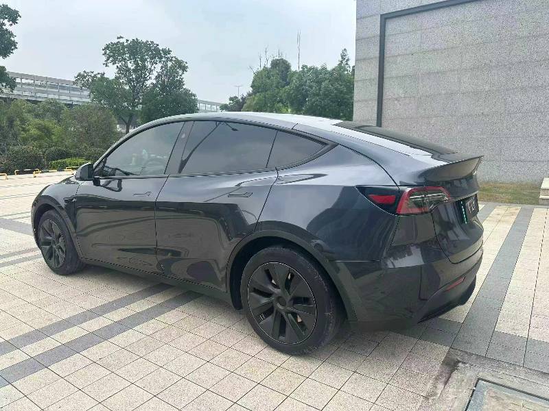 Tesla Model Y 2024 #7 Tesla Model Y 2024 car image #7