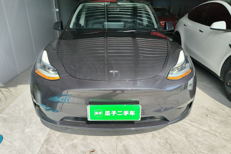 Tesla Model Y 2024 #3 Tesla Model Y 2024 car image #3