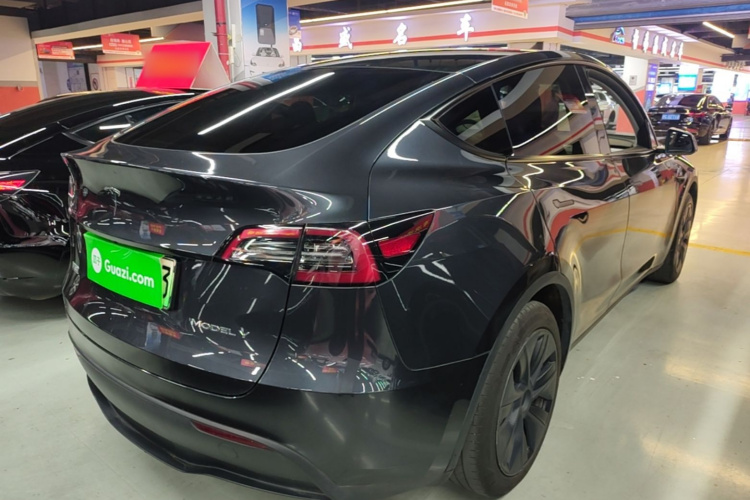 Tesla Model Y 2024 #7 Tesla Model Y 2024 car image #7
