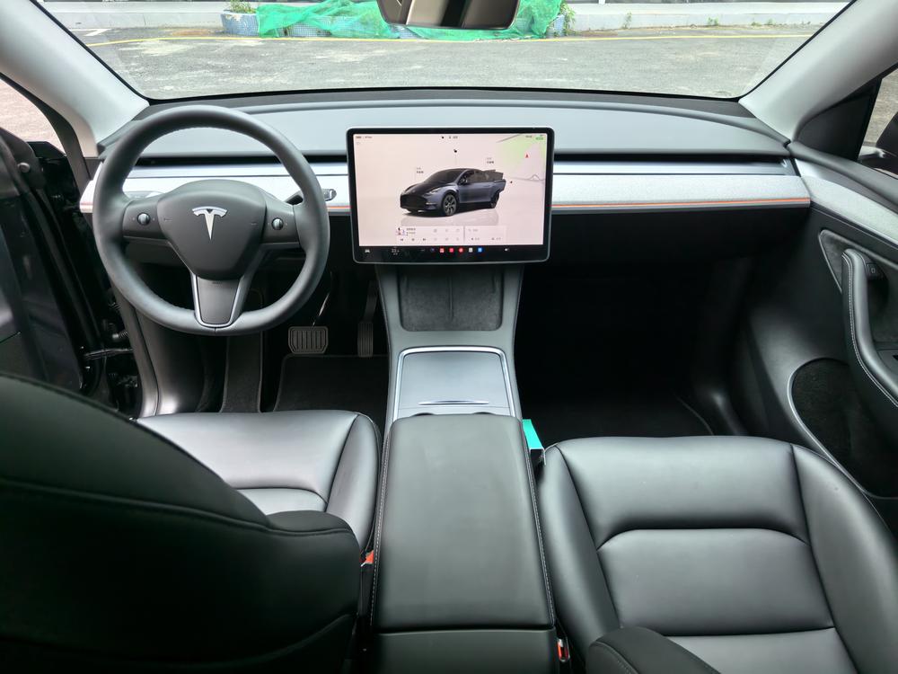 Tesla Model Y 2024 #7 Tesla Model Y 2024 car image #7