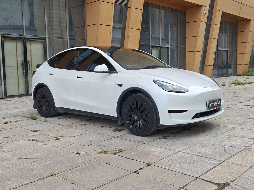 Tesla Model Y 2024 #3 Tesla Model Y 2024 car image #3
