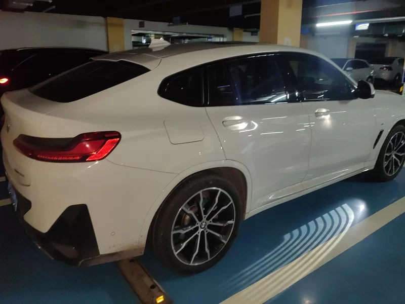 BMW X4 M40i 2024 #3 BMW X4 M40i 2024 car image #3