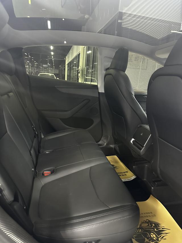 Tesla Model Y 2025 car image #13