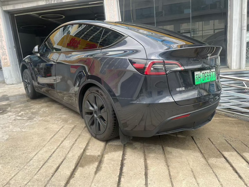 Tesla Model Y 2024 #6 Tesla Model Y 2024 car image #6