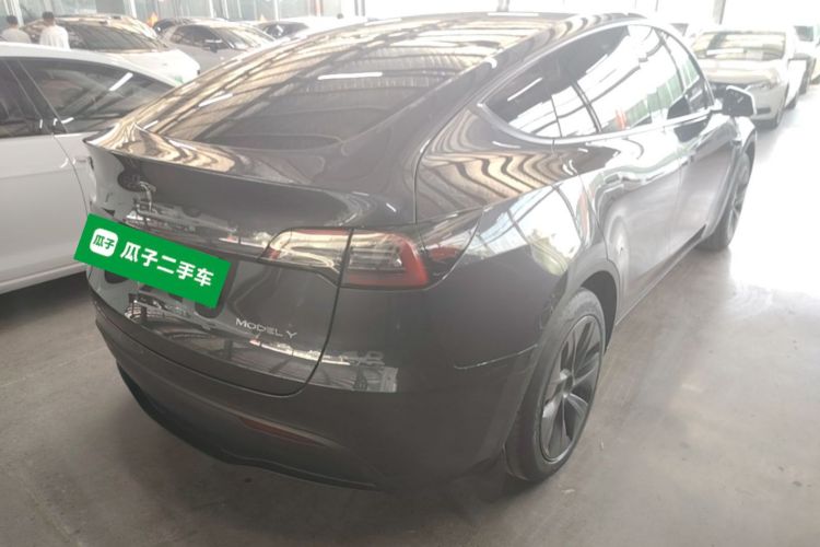 Tesla Model Y 2024 #7 Tesla Model Y 2024 car image #7