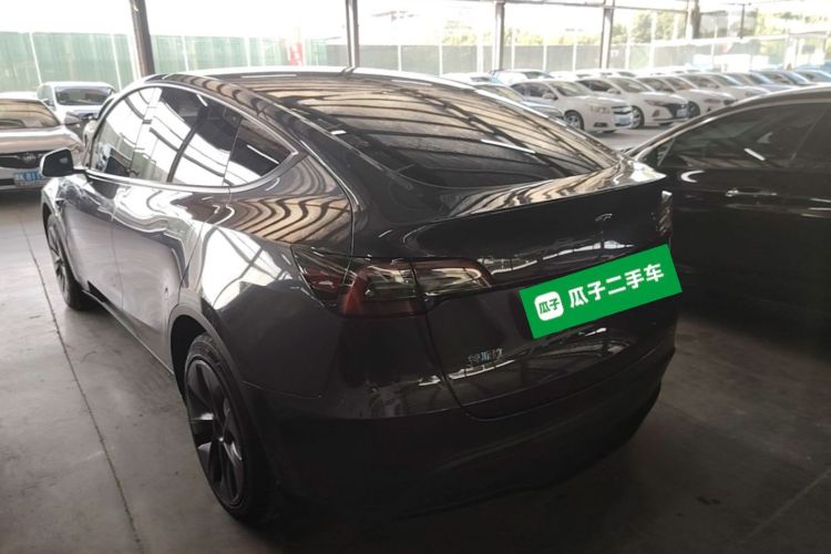 Tesla Model Y 2024 #5 Tesla Model Y 2024 car image #5