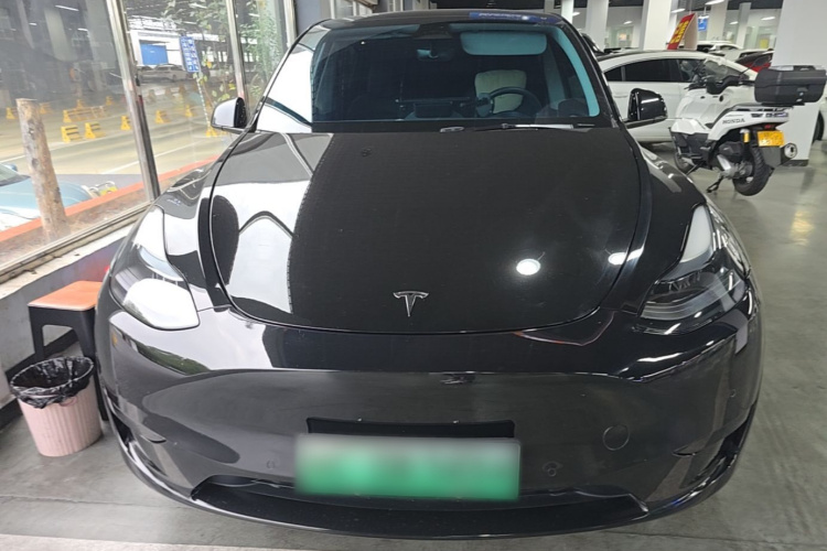 Tesla Model Y 2024 #3 Tesla Model Y 2024 car image #3
