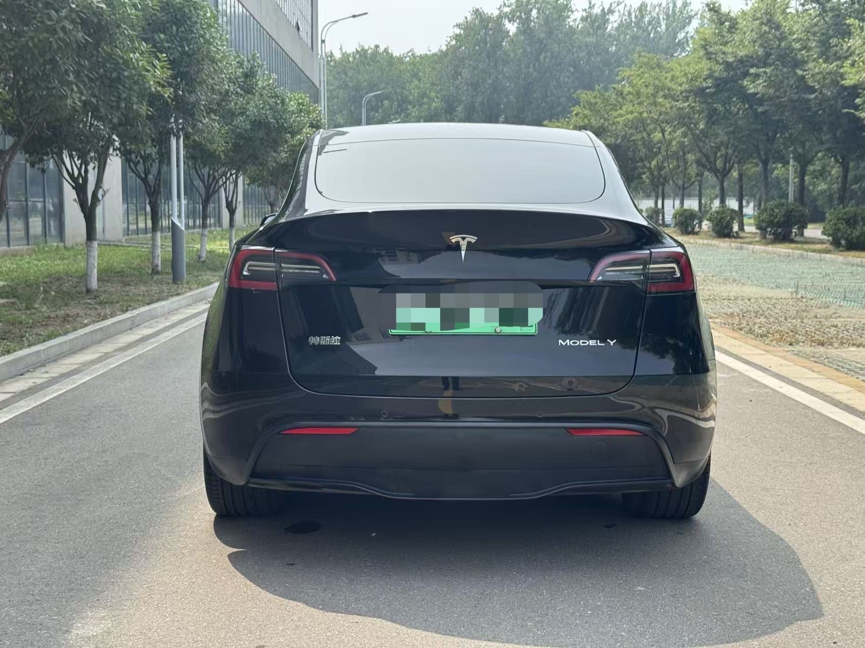 Tesla Model Y 2023 #7 Tesla Model Y 2023 car image #7
