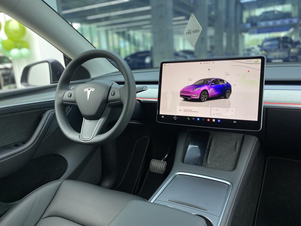 Tesla Model Y 2025 #23 Tesla Model Y 2025 car image #23