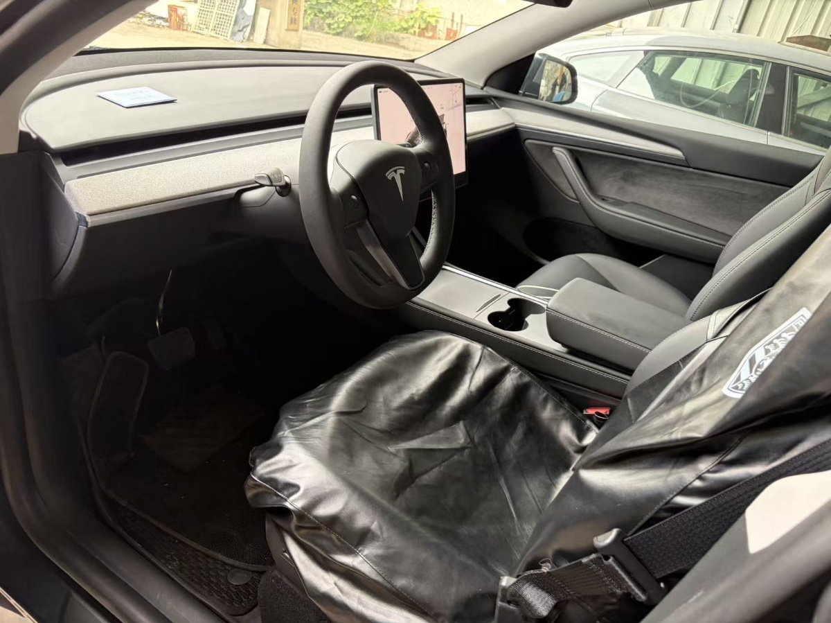 Tesla Model Y 2024 #2 Tesla Model Y 2024 car image #2