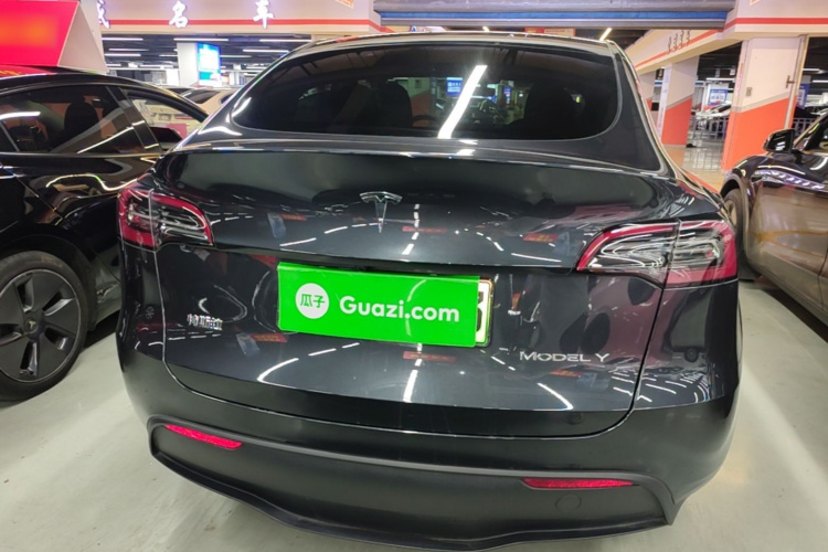 Tesla Model Y 2024 #6 Tesla Model Y 2024 car image #6