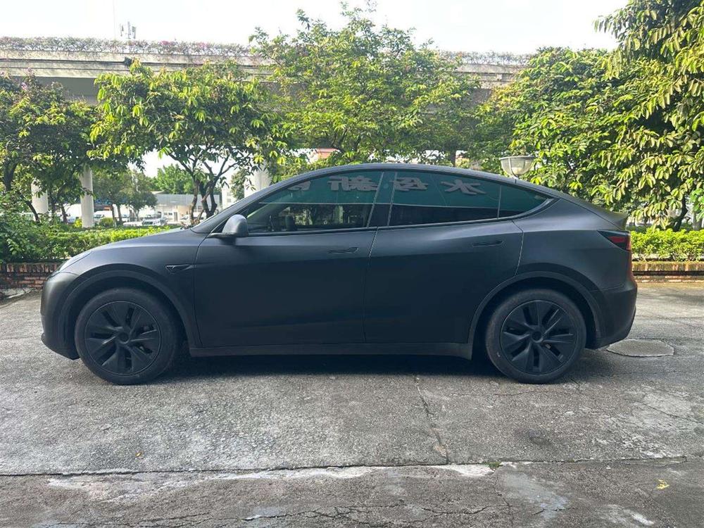 Tesla Model Y 2024 #4 Tesla Model Y 2024 car image #4