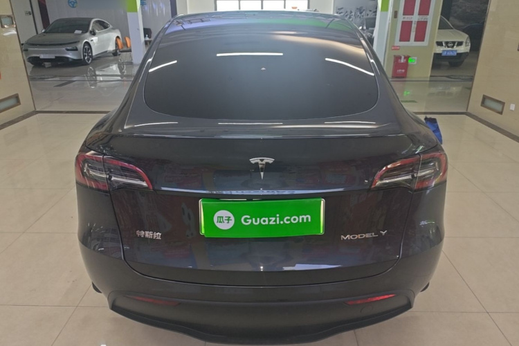 Tesla Model Y 2024 #6 Tesla Model Y 2024 car image #6