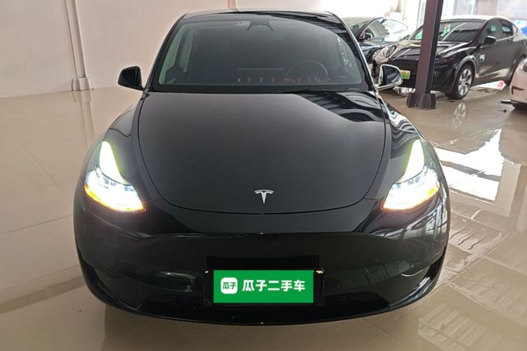 Tesla Model Y 2024 #3 Tesla Model Y 2024 car image #3
