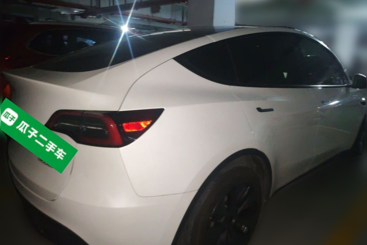 Tesla Model Y 2024 #7 Tesla Model Y 2024 car image #7