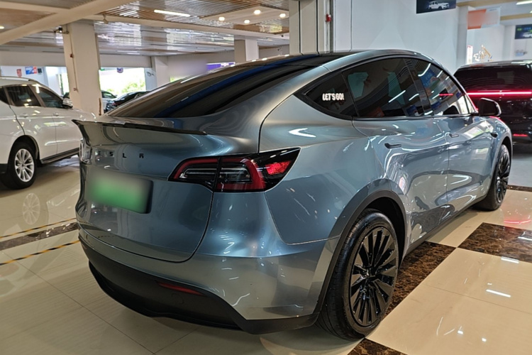 Tesla Model Y 2024 #7 Tesla Model Y 2024 car image #7