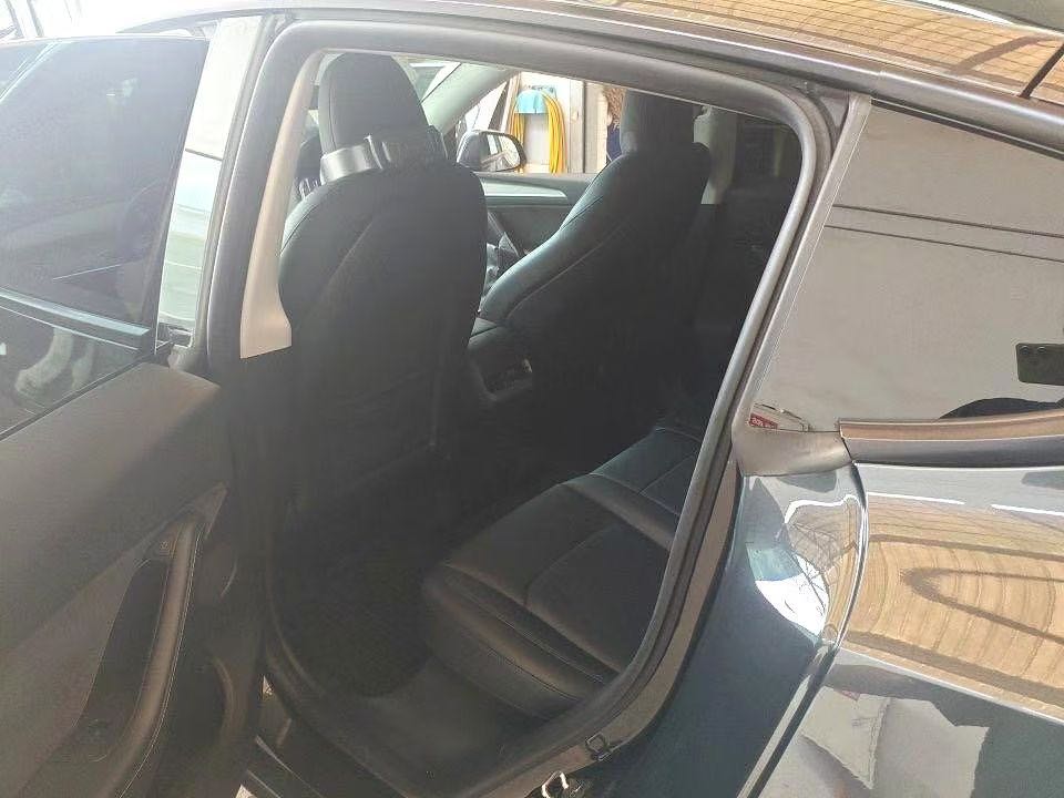 Tesla Model Y 2024 #6 Tesla Model Y 2024 car image #6