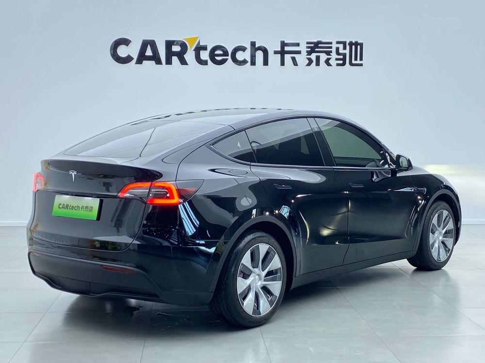 Tesla Model Y 2023 #4 Tesla Model Y 2023 car image #4