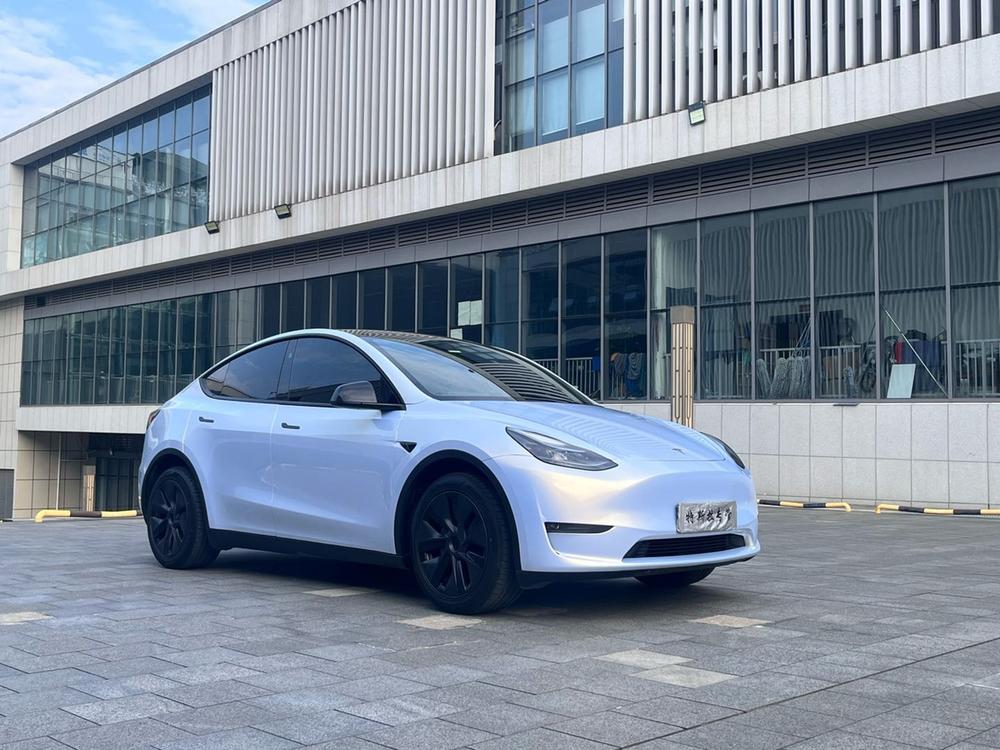 Tesla Model Y 2024 #3 Tesla Model Y 2024 car image #3