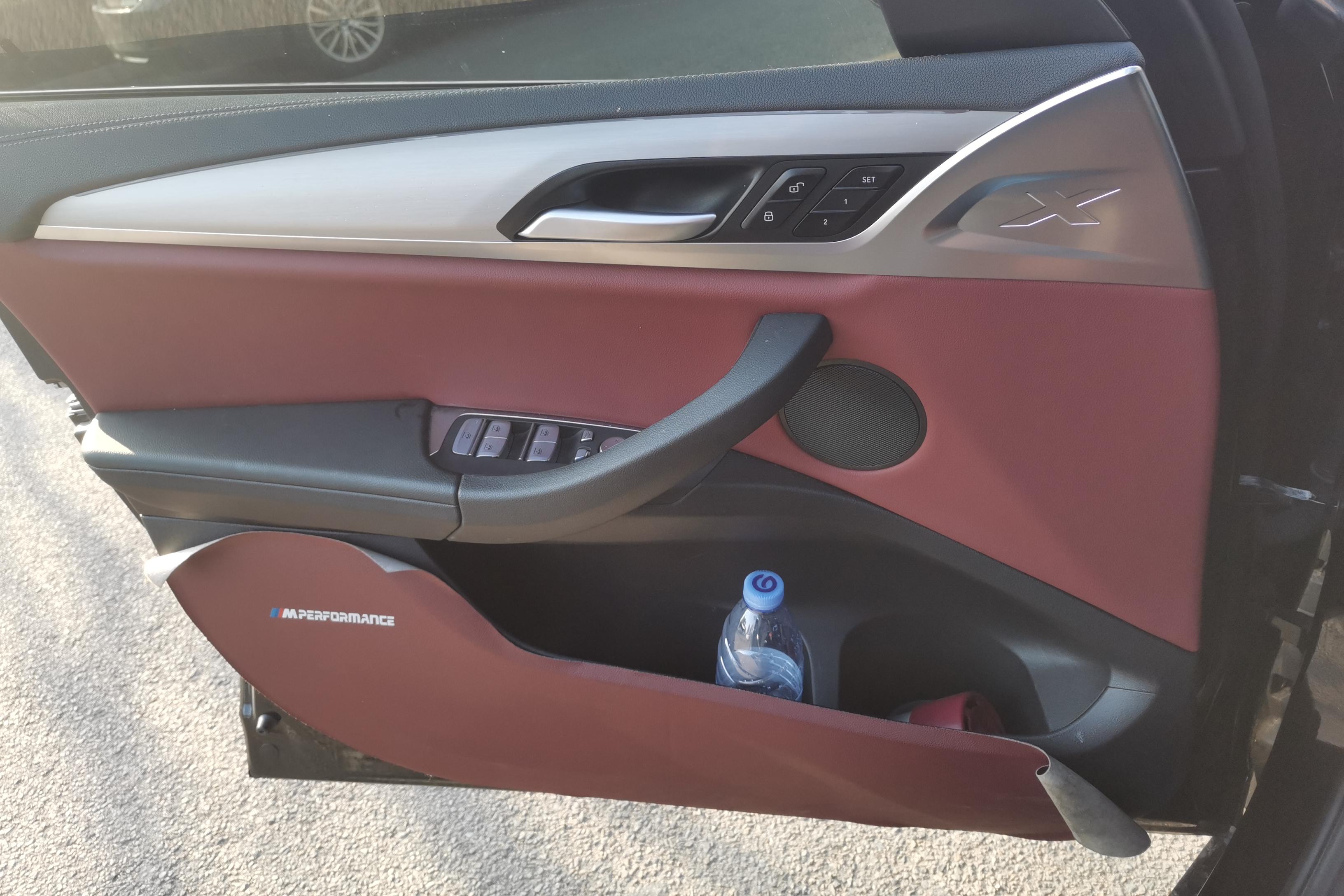 BMW X4 M40i 2023 immagine di auto #21