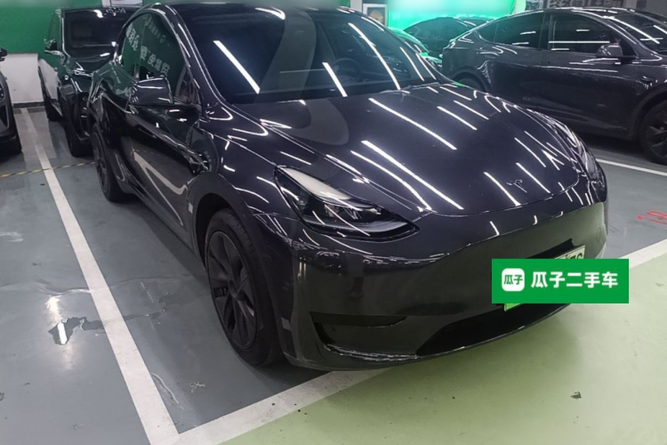 Tesla Model Y 2024 #4 Tesla Model Y 2024 car image #4