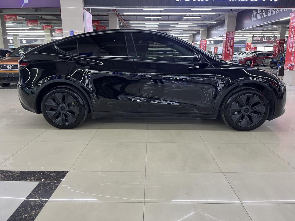 Tesla Model Y 2024 #7 Tesla Model Y 2024 car image #7
