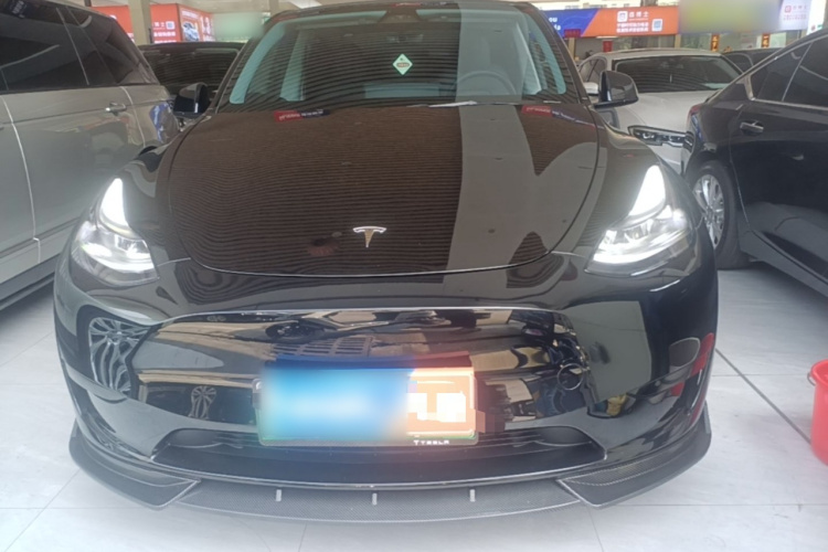 Tesla Model Y 2024 #3 Tesla Model Y 2024 car image #3