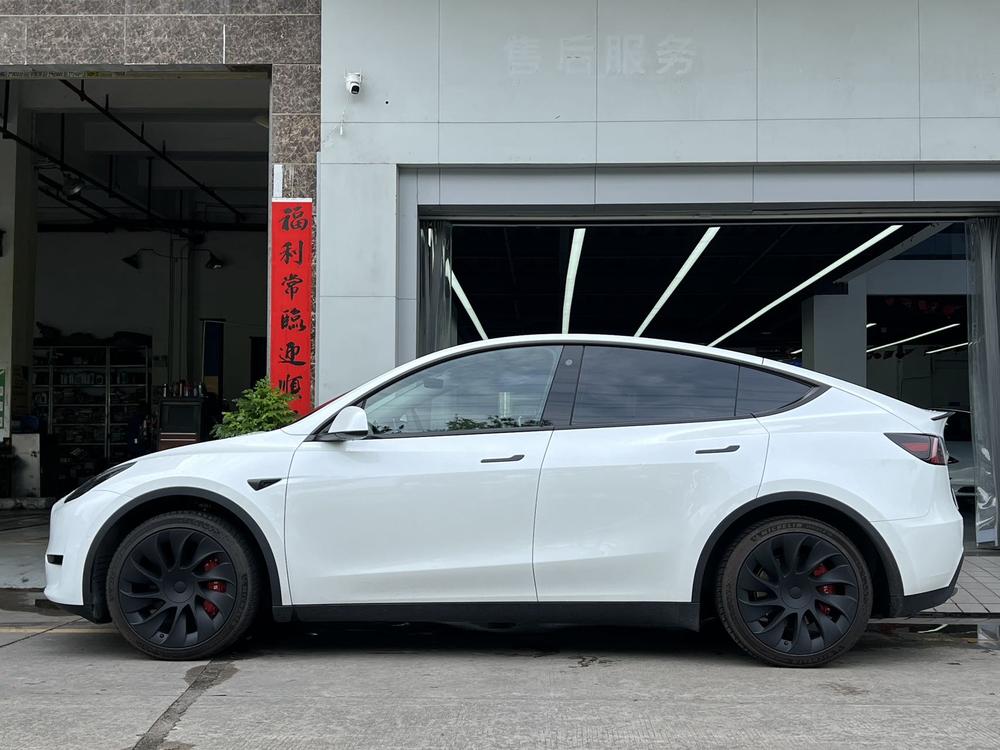 Tesla Model Y 2024 #3 Tesla Model Y 2024 car image #3